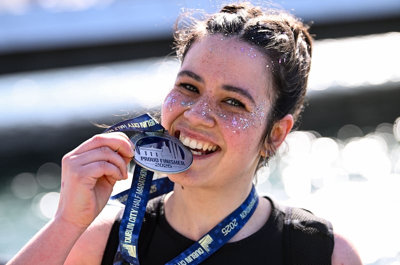 Dámaris Berruezo celebrates with her medal after the race. Photograph: Ramsey Cardy/Sportsfile