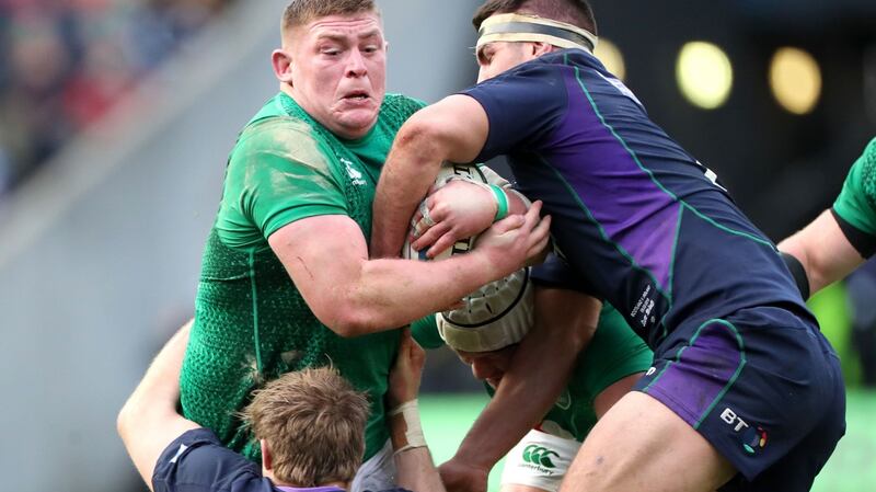 Scotland’s Stuart McInally and Ireland’s Tadhg Furlong. Photograph: Billy Stickland/Inpoh