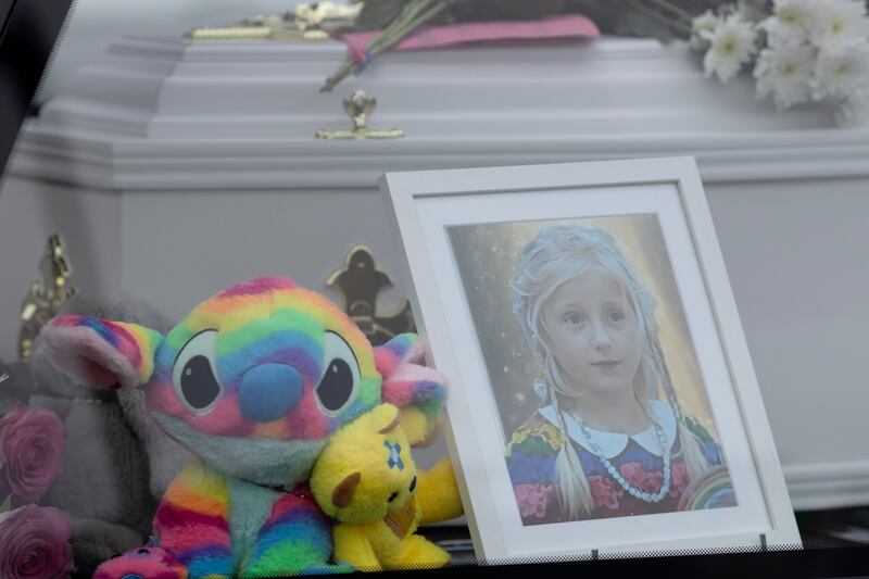 Stuffed toys and a portrait of Julia Daczkowska with her coffin on Thursday. Photograph: Chris Maddaloni