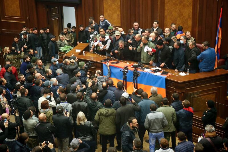 CAUCASUS CRISIS: Uproar rules in the Armenian parliament in Yerevan after protesters broke into the parliamentary building to demonstrate against an agreement with Azerbaijan to halt fighting over the disputed Nagorno-Karabakh region. Armenian prime minister Nikol Pashinian said on Facebook that calling an end to the violence was "extremely painful for me personally and for our people". Photograph: Dmitri Lovetsky/AP Photo