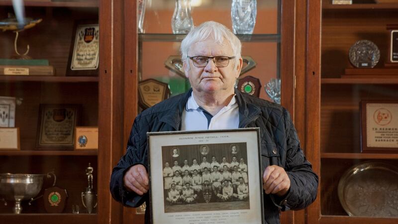 Redmonds GAA Club chairman Mick O’Shea pictured holding a photograph of the club’s 1948-50 Junior Minor Football team at their clubhouse in Tower Street, Ballyphehane, Cork city. Photograph: Daragh Mc Sweeney/Provision