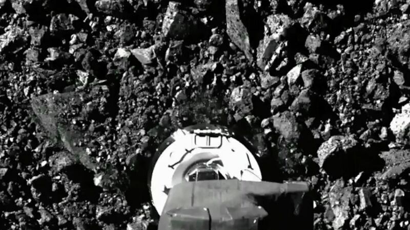 The Osiris-Rex spacecraft touching the surface of asteroid Bennu on Tuesday, October  20th. Photograph: NASA via AP