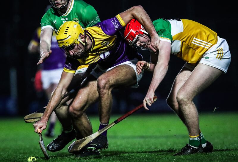 Wexford's Tomás Kinsella tackles Offaly's Sam Bourke during the Division 1A league clash at Chadwick's Wexford Park, Wexford. Photograph: Leah Scholes/Inpho