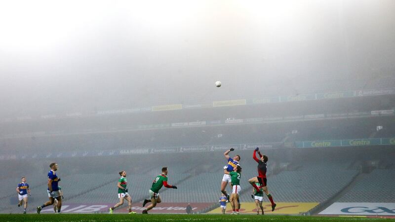Mayo’s David Clarke and Oisín Mullin contest a high ball with Steven O’Brien of Tipperary. Photo: Ryan Byrne/Inpho