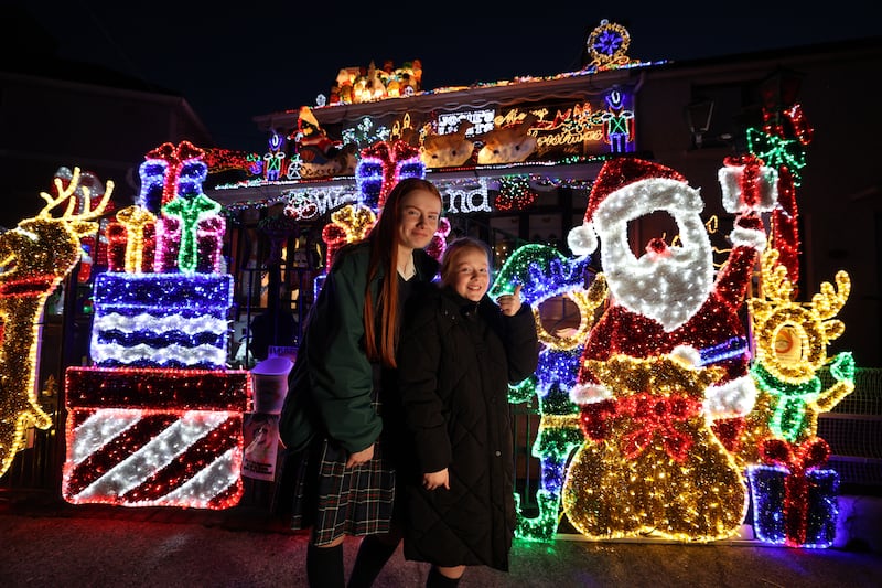 Emily (15) and Olivia (9) Geoghegan from Greenhills, Dublin, at Josie's Christmas Lights in Crumlin. Photograph: Nick Bradshaw 