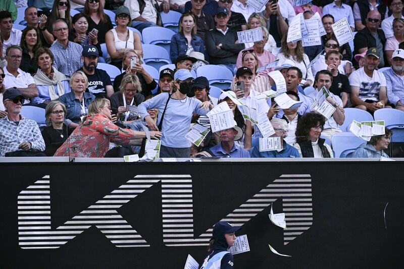 A pro-Palestinian protester throws leaflets onto the court during the men's singles match between Britain's Cameron Norrie and Germany's Alexander Zverev at Australian Open. Photograph: William West/AFP via Getty Images