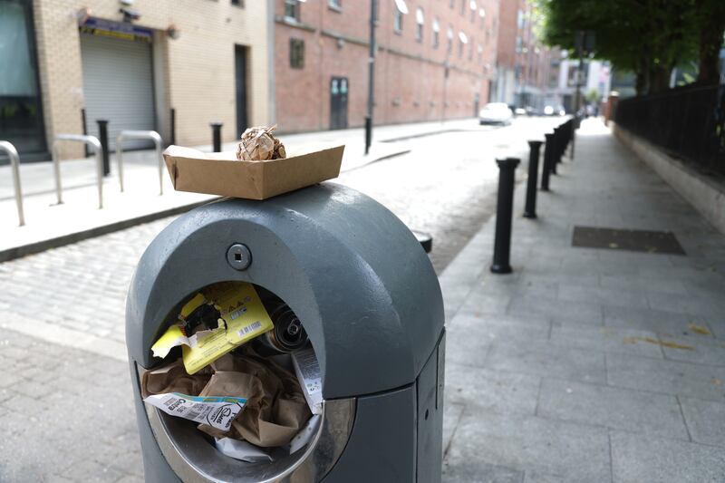 An overflowing bin on Foley Street. Photograph: Bryan O'Brien