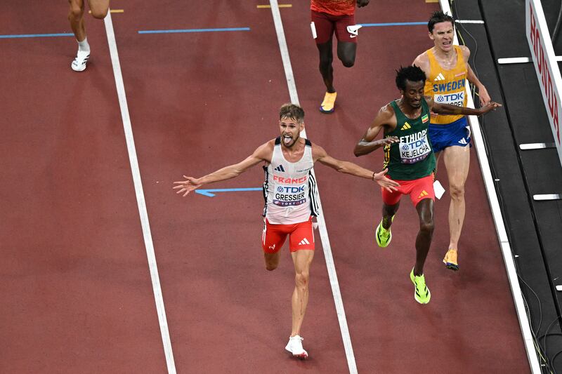 France's Jimmy Gressier celebrates after winning the men's 10,000m final in Tokyo. Photograph: Philip Fong/AFP via Getty Images        
