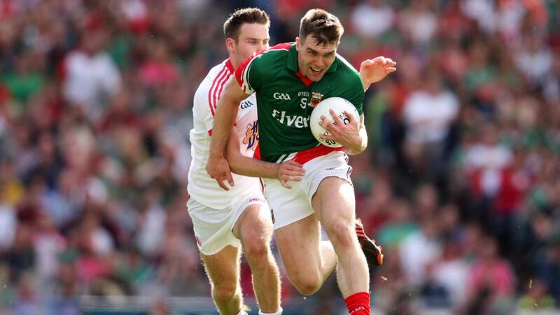 Mayo’s Seamus O’Shea gets away  from Ciaran McGinley of Tyrone. Mayo are lacking someone of his stature at midfield, says Billy Joe Padden. Photograph: Cathal Noonan/Inpho 