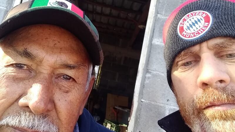 Macario Garza Flores, my father-in-law (suegro) and me - Colin Carberry - outside his tyre shop in in Villaseca, Mexico
