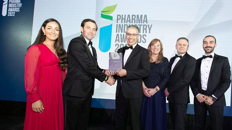 Edward Demartini, CEO, Quick Group of Companies, presents the Pharma Research Centre of the Year award to the PMTC team.