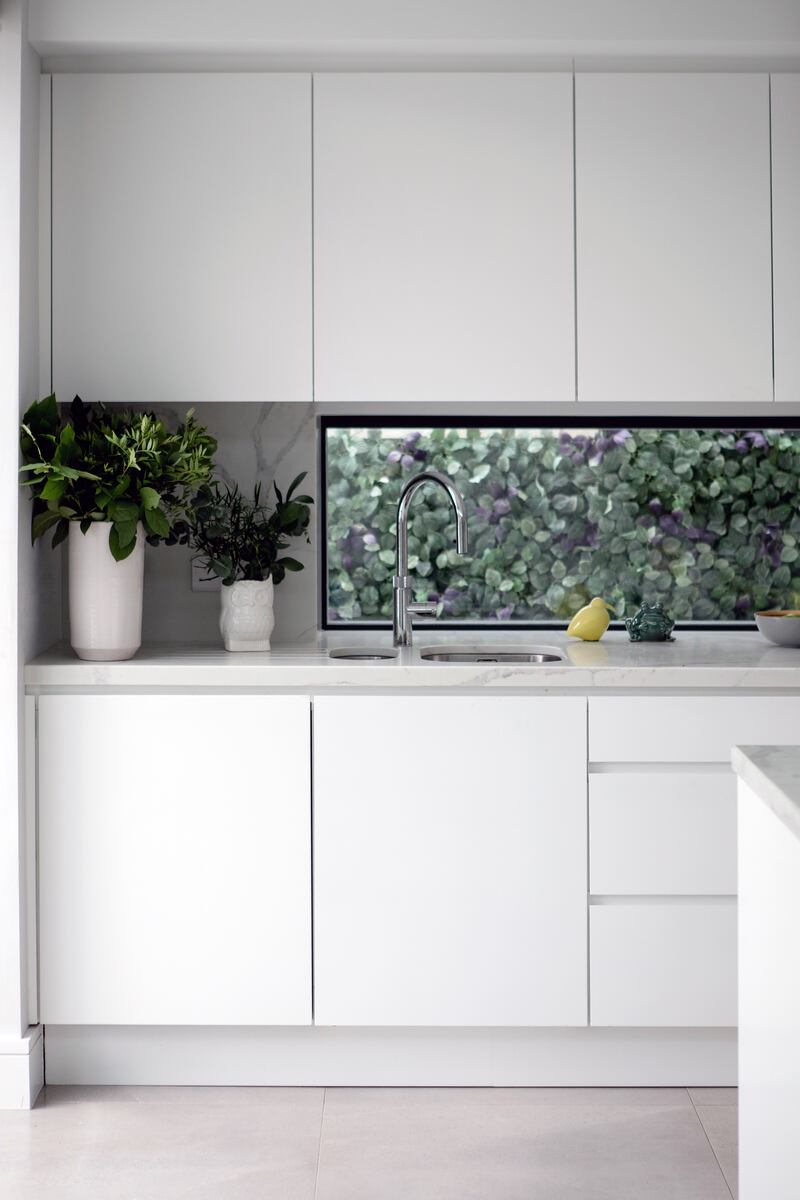 If your countertop runs along a window, consider dropping the cill height to match your countertop. Photograph: Ruth Maria Murphy