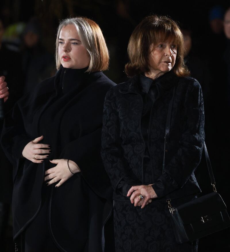 John Bruton's widow Finola Bruton and daughter Mary Elizabeth Bruton:  'John was a family man. Family was the centre of John’s life,' said Fr Patrick O'Connor at the removal ceremony. Photograph: Julien Behal/Government Information Service