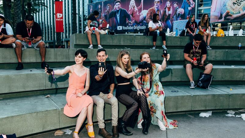 From left: Emma Green, Jesse George, Christine Riccio and Maureen Graham outside VidCon in California. As the attention and money paid to stars on sites like YouTube and Instagram balloon, the stakes for both them and brands to find the right match are rising. Photo: Graham Walzer/The New York Times
