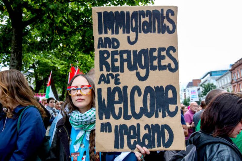 Protestors attend a "unity over division" protest called to oppose an anti-immigration demonstration in Belfast on Friday. Photograph: Paul Faith/AFP/Getty Images
