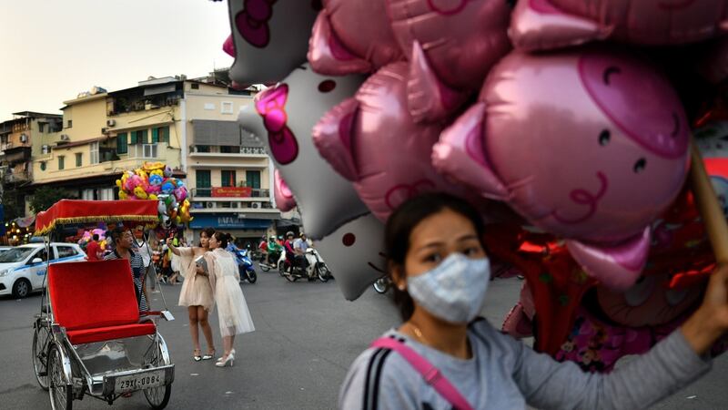 ‘I experienced some bad travel burnout and exhaustion in Hanoi, where I stopped to spend 11 days and wait for the Vietnamese New Year holiday of Tet to pass’. Photograph: Manan Vatsyayana/AFP/Getty