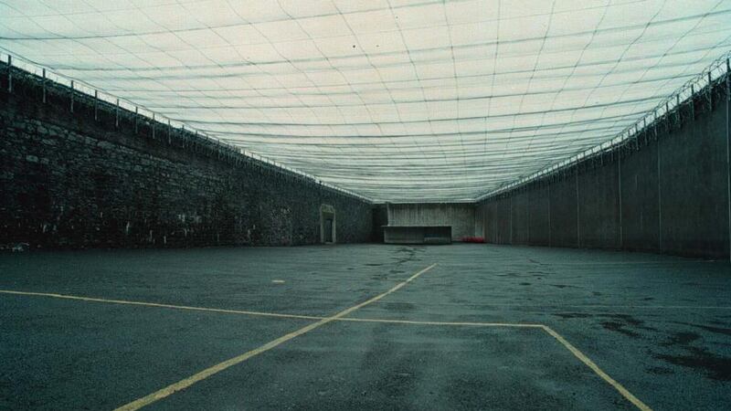 The new prison will accommodate 275 prisoners but will have only 30 designated single cells.  The covered recreation yard  at Cork Prison. Photograph: Alan Betson/The Irish Times
