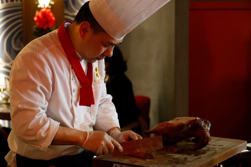 China Tang: Chef Zhan Hua Yang carves duck. Photograph: Nick Bradshaw