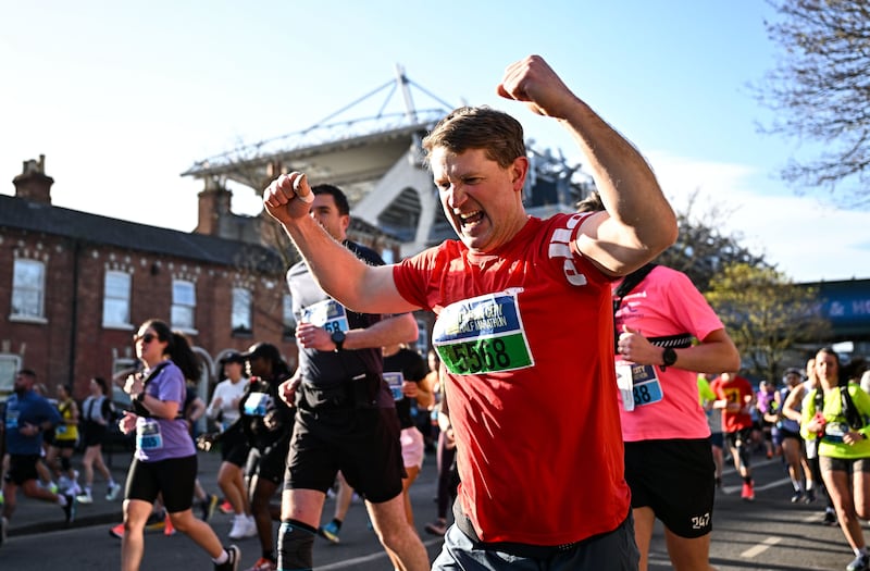 David Campbell and other participants pass Croke Park during the race. Photograph: Sam Barnes/Sportsfile