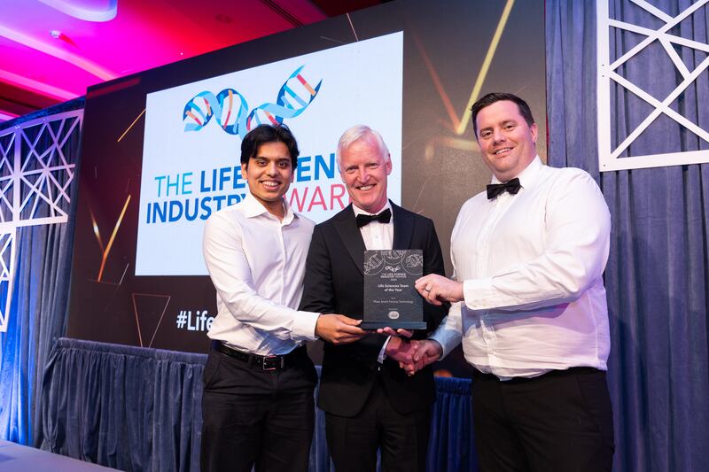 Peter Keane, technical director at Ellab Ireland, presents the life sciences team of the year award to Ronan Kelly and Abdullah Ahmed, Pfizer Smart Factory Technology