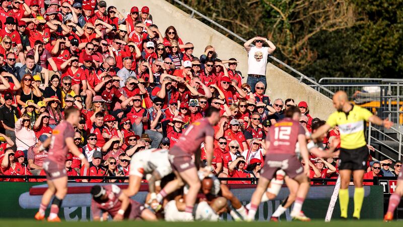 Munster fans watch on during the game at Stade Marcel Deflandre. Photograph: Ben Brady/Inpho