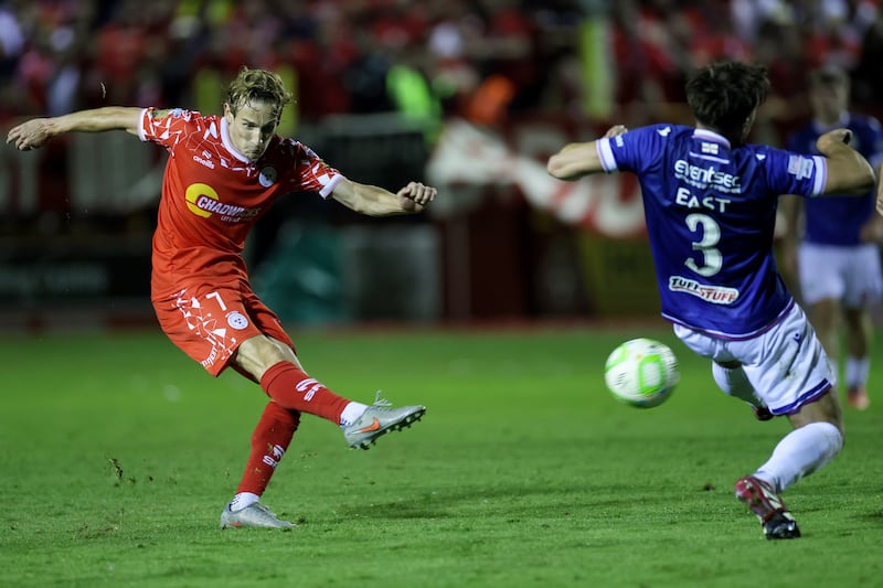 Shelbourne's Harry Wood takes a shot at goal but is denied by Linfield's Euan East. Photograph: Laszlo Geczo/Inpho