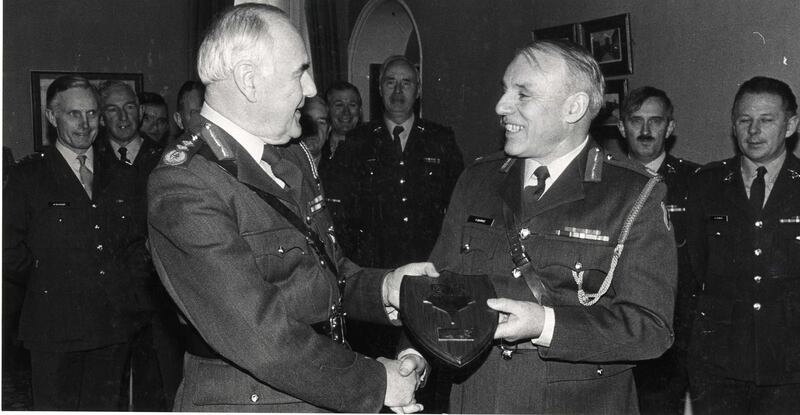 Brigadier General Vincent Savino (right) in 1986 presenting a family plaque to Lieutenant General Gerald O'Sullivan, chief of staff of the Defence Forces, at a lunch to mark O'Sullivan's retirement, which was given by the officers of Collins Barracks, Dublin.  Photograph: Paddy Whelan