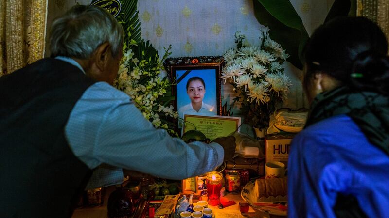 Relatives at a memorial for Pham Thi Tra My (26), one of 39 Vietnamese people found dead in a refrigerated trailer in Britain  on October 29th. Photograph: Minzayar Oo/The New York Times