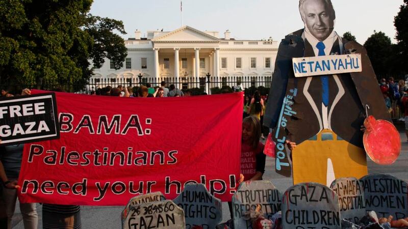 A cardboard cut out of Israeli Prime Minister Benjamin Netanyahu is placed during a silent candlelight vigil in front of the White House in Washington. Israel has pressed ahead with its Gaza offensive saying it is days from achieving its core goal of destroying all Islamist guerrilla cross-border attack tunnels, but a soaring Palestinian civilian toll has triggered international alarm. Photograph: Yuri Gripas/Reuters