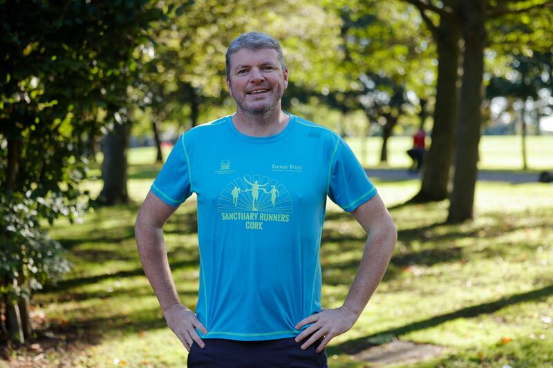 Graham Clifford, former journalist and co-founder of Sanctuary Runners, is leading by example, running in the Dublin City Marathon for the first time in four years. Photograph: Alan Betson