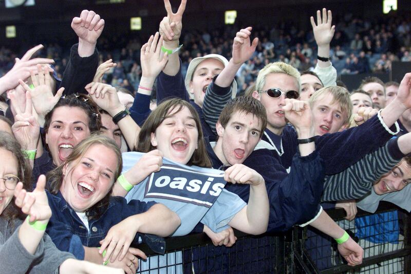 Fans wait for Oasis to come onstage at Lansdowne Road (now the Aviva Stadium), Dublin, In July 2000. Photograph: Collins Photos