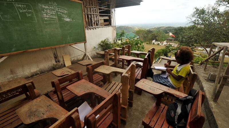 An Ayta elementary student at Porac, Pampanga, north of Manila in the Philippines. Spoken by just 3,000 people in the hills northwest of Manila, Ayta Magindi is one of several dozen endangered languages in the archipelago, which is home to 168 of the world’s 6,000-plus known tongues. Photograph: Noel Celis/AFP/Getty Images