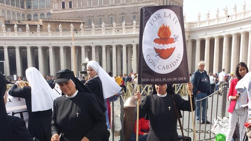 Pilgrims gather in Rome this evening ahead of ceremonies tomorrow to mark the canonisation of Popes John XXIII and John Paul II. Photograph: Patsy McGarry.