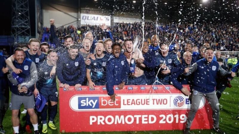 Bury secured promotion to League One last season despite players going unpaid. Photograph: Martin Rickett/PA