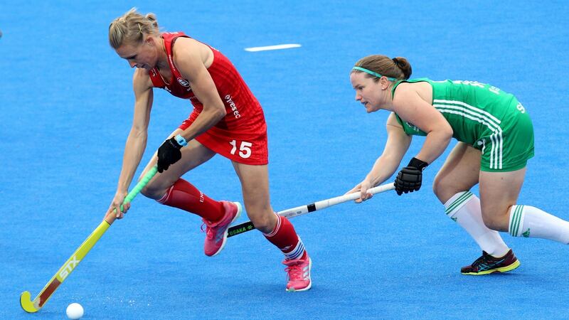Ireland’s Shirley McCay in action against  England’s Alex Danson. Photograph: Sean Dempsey/EPA