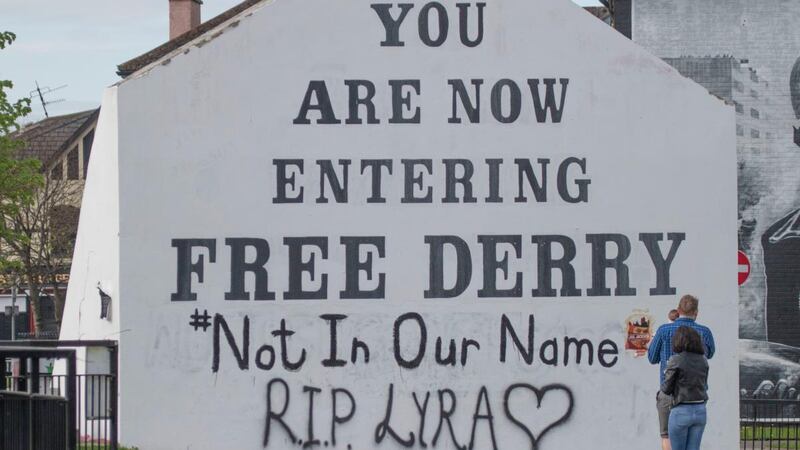 A message of condolence for murdered  29-year-old journalist Lyra McKee has been graffitied on to the Free Derry Corner. Photograph:  Joe Boland/PA