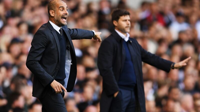 Manchester City manager Pep Guardiola with his Tottenham counterpart Mauricio Pochettino.  Photograph: Shaun Botterill/Getty Images.