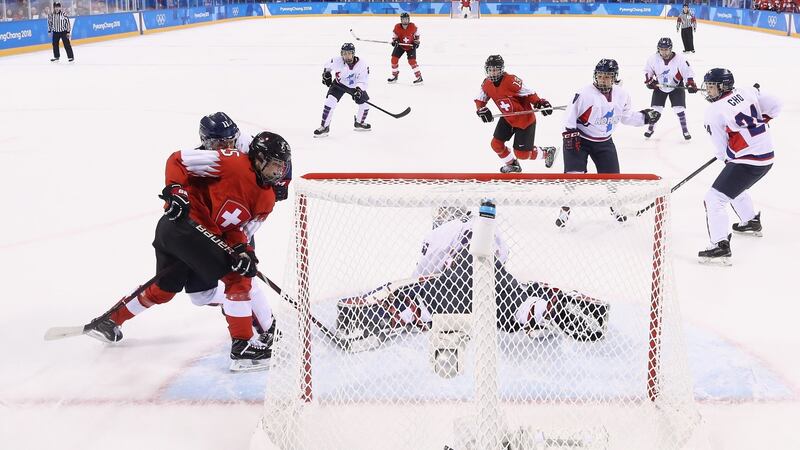 Alina Muller of Switzerland scores a goal past So Jung Shin of Korea. Photo: Bruce Bennett/Getty Images