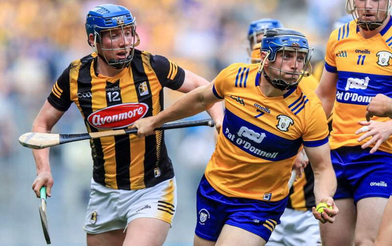John Donnelly of Kilkenny pursues Clare's David McInerney in the All-Ireland semi-final. Photograph: Evan Treacy/INPHO