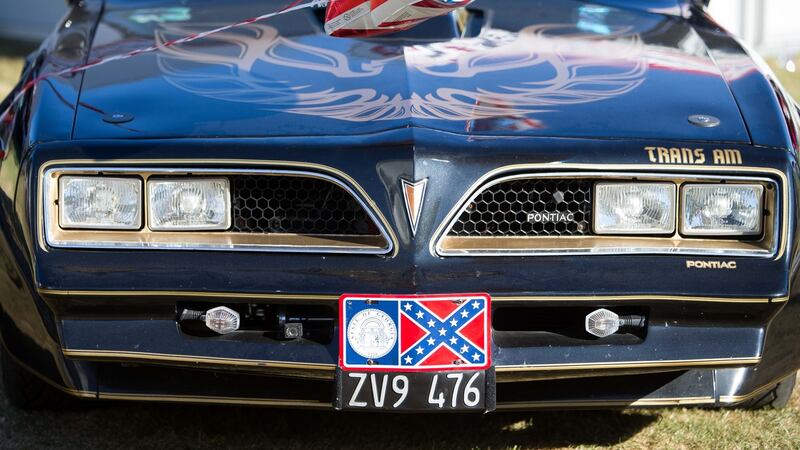 A car pictured with confederate flag number plates at US Independence Day celebrations at the Phoenix Park event. Photo: Tom Honan
