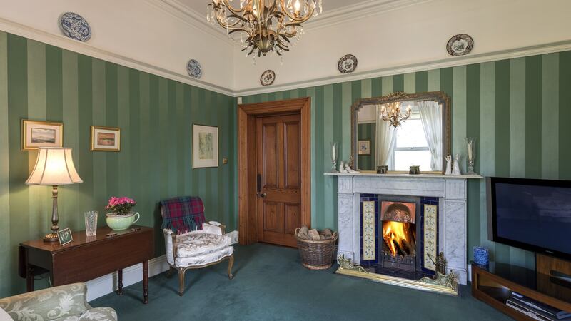 Sitting room, with windows to the front and side