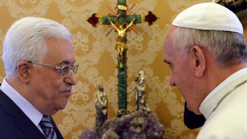 Pope Francis meets Palestinian president Mahmoud Abbas during a private audience in the pontiff library at the Vatican, today. Photograph: Maurizio Brambatti/Pool/Reuters
