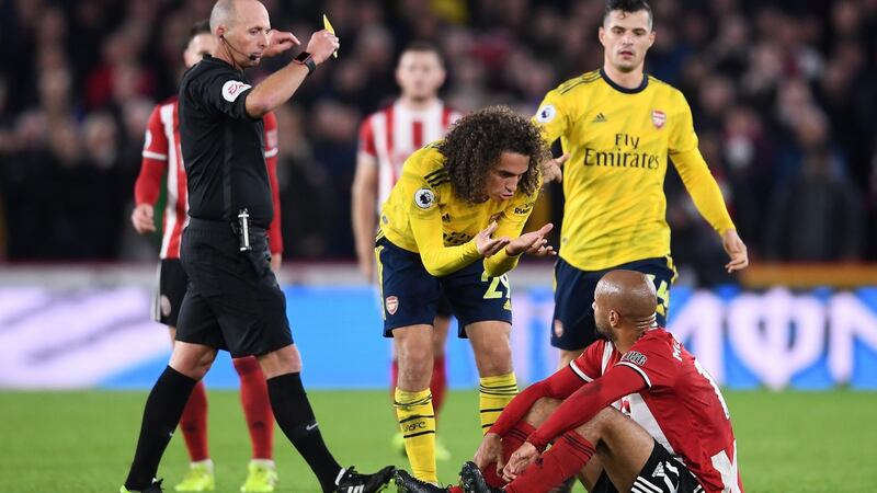 Matteo Guendouzi speaks with David McGoldrick. Photo: Laurence Griffiths/Getty Images