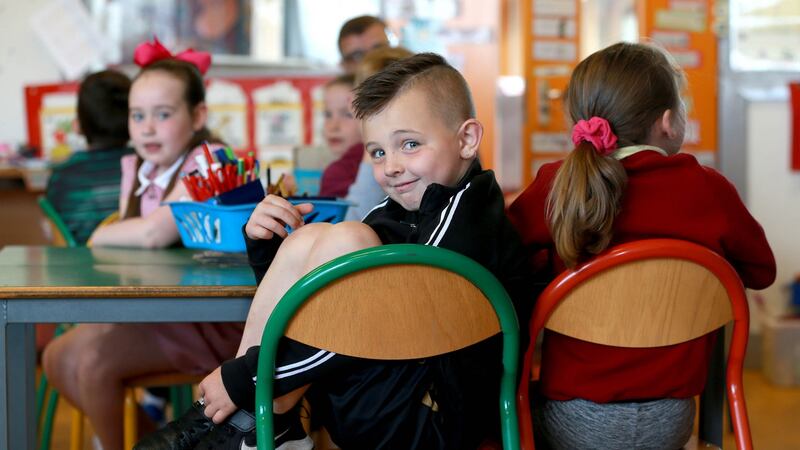 Pupils at Bunscoil an tSléibhe Dhuibh in Ballymurphy, Belfast, are among the 7,000 children being taught through Irish across the North. Photograph: Stephen Davison