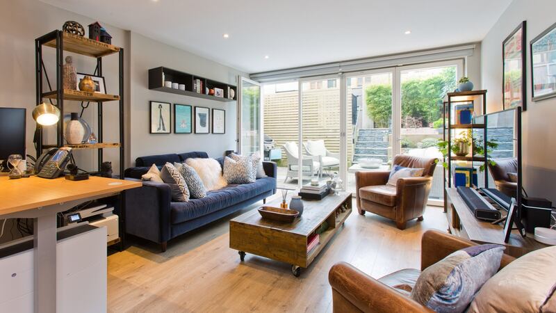 The open-plan kitchen-dining and living area.