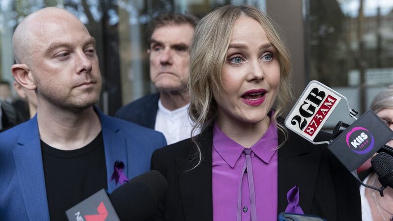 Eryn Jean Norvill (C) speaks to the media after damages were awarded to Geoffrey Rush on Wednesday. Photograph:  Brook Mitchell/Getty Images