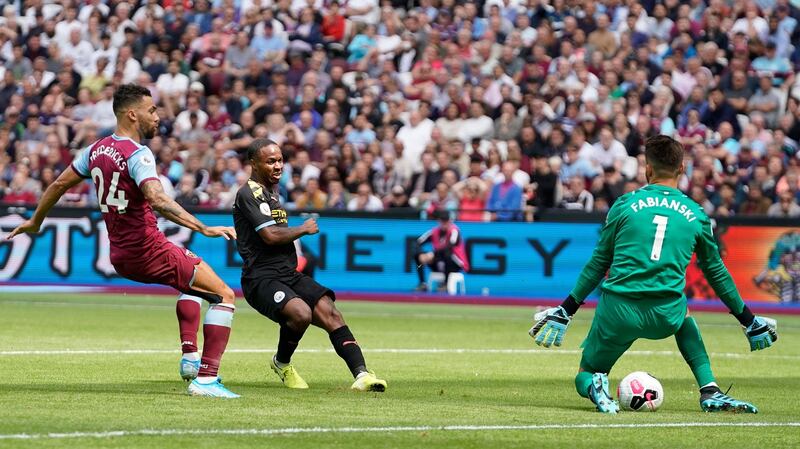 Manchester City’s Raheem Sterling scores against West Ham at the London Stadium. Photograph: EPA