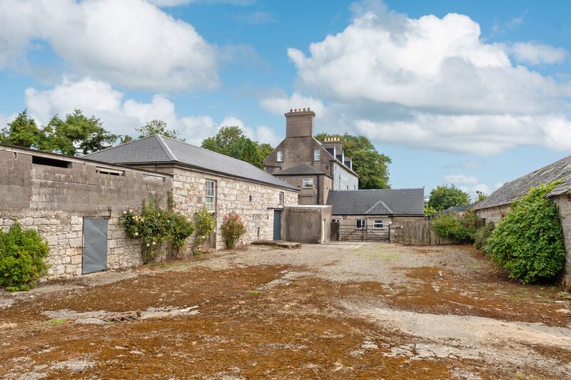 A courtyard lies to the rear