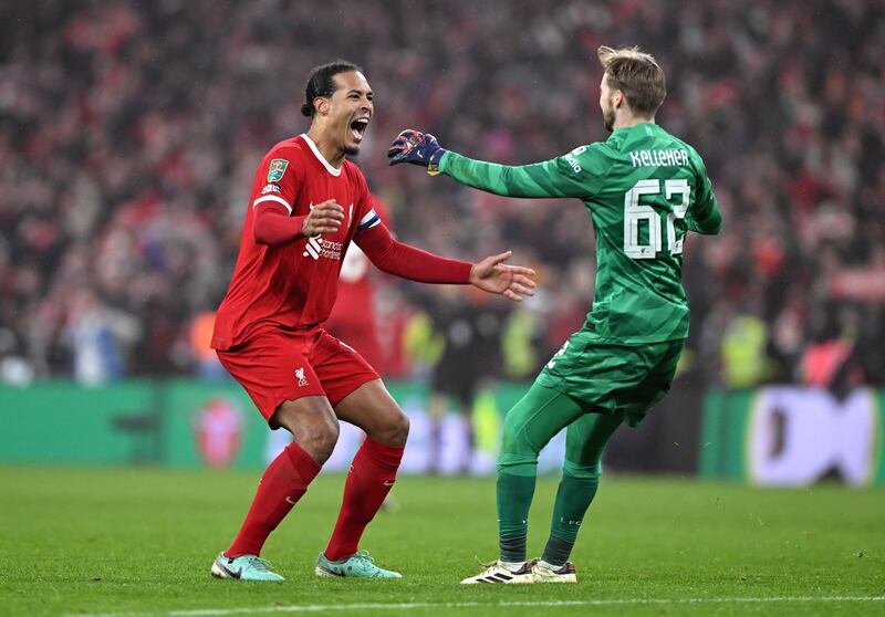 Virgil van Dijk and Caoimhin Kelleher of Liverpool celebrate. Photograph: Mike Hewitt/Getty