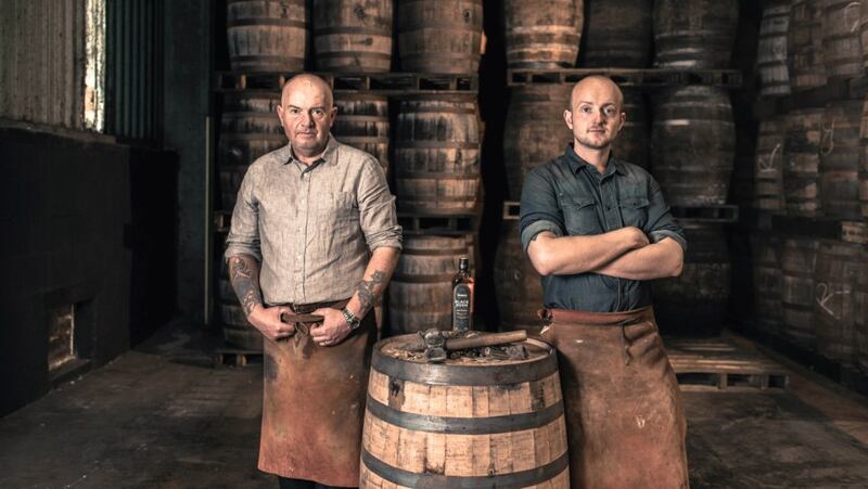 Alastair Kane and his son Chris in the Old Bushmills Distillery